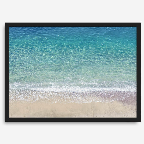 This fine art aerial beach print showcases the mesmerizing colors of the ocean in vivid detail. From the deep blue depths to the vibrant greenish turquoise blue, transitioning to the golden sandy beach and the crashing white surf.