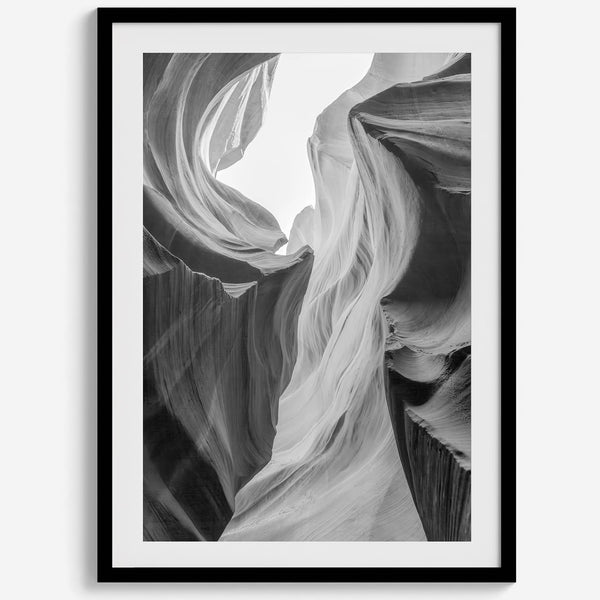 Black and white Antelope Canyon wall art showcasing deep shadows and intricate rock formations in Arizona’s iconic slot canyon.