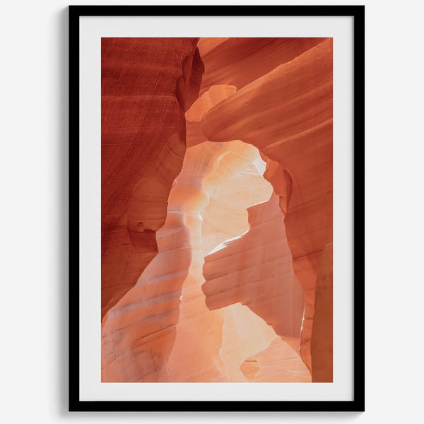 A fine art Arizona Desert print showcasing Antelope Canyon in Arizona. The three layers of rocks in varying colors and creamy textures create a stunning minimalist desert landscape, with vibrant reds and oranges adding warmth to any space.