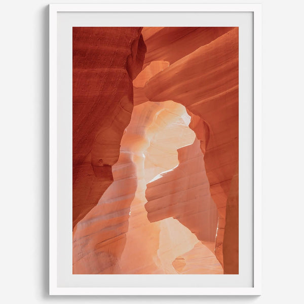 A fine art Arizona Desert print showcasing Antelope Canyon in Arizona. The three layers of rocks in varying colors and creamy textures create a stunning minimalist desert landscape, with vibrant reds and oranges adding warmth to any space.