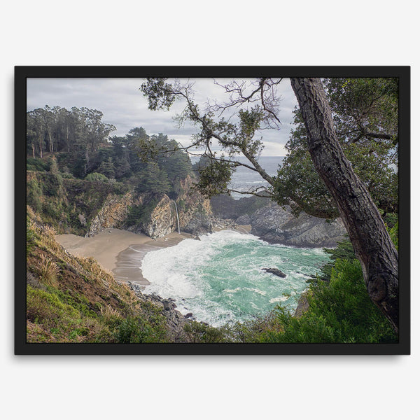 This fine art coastal ocean print features a breathtaking view of Mcway Falls in Big Sur, California, falling to the beach and into the ocean. This fine art photography print captures the beauty and wilderness of nature.
