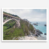 A fine art ocean print of one of the most iconic spots in the famous Route 1 in California - Bixby Bridge near Big Sur. Shot in a unique wide angle that captures the bridge, cliffs, the ocean, and the stunning beach below.