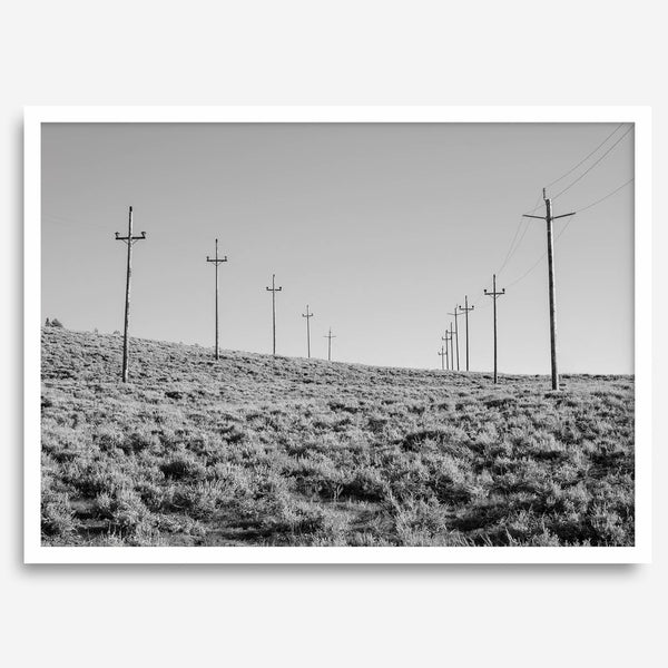 A black and white fine art photography print showcasing desert power lines in the Eastern Sierras in Americana decor style.