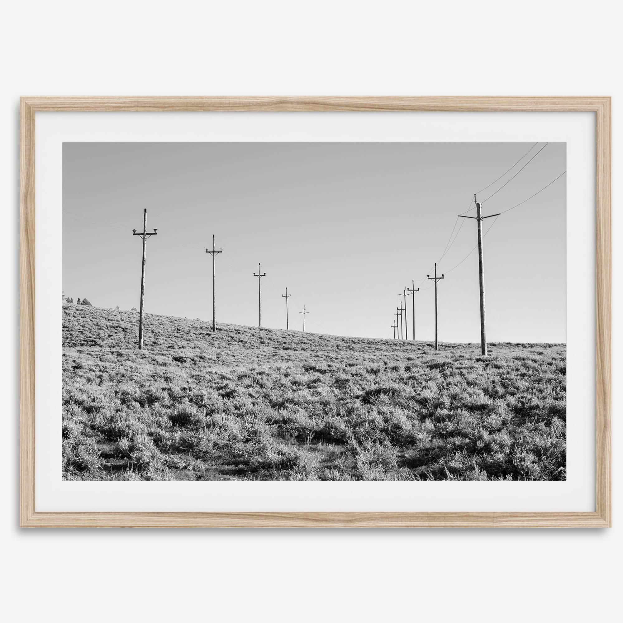 A black and white fine art photography print showcasing desert power lines in the Eastern Sierras in Americana decor style.