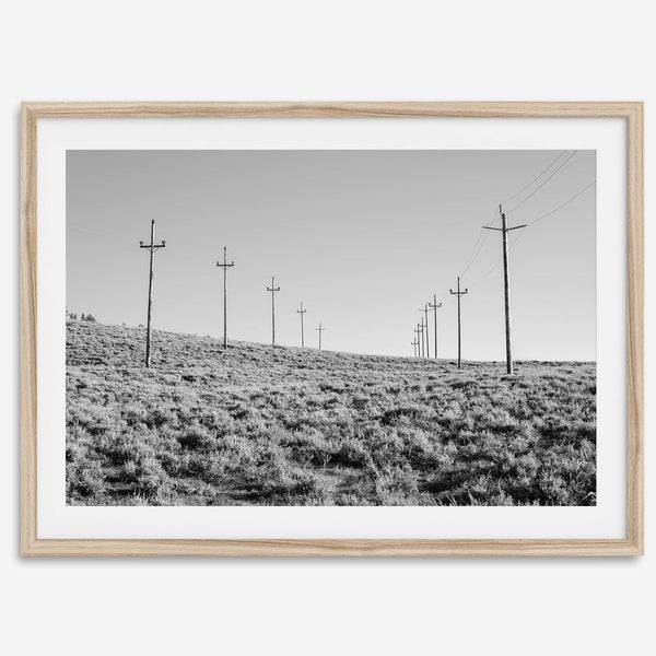 A black and white fine art photography print showcasing desert power lines in the Eastern Sierras in Americana decor style.