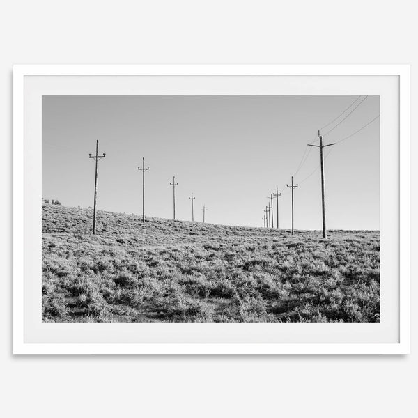 A black and white fine art photography print showcasing desert power lines in the Eastern Sierras in Americana decor style.