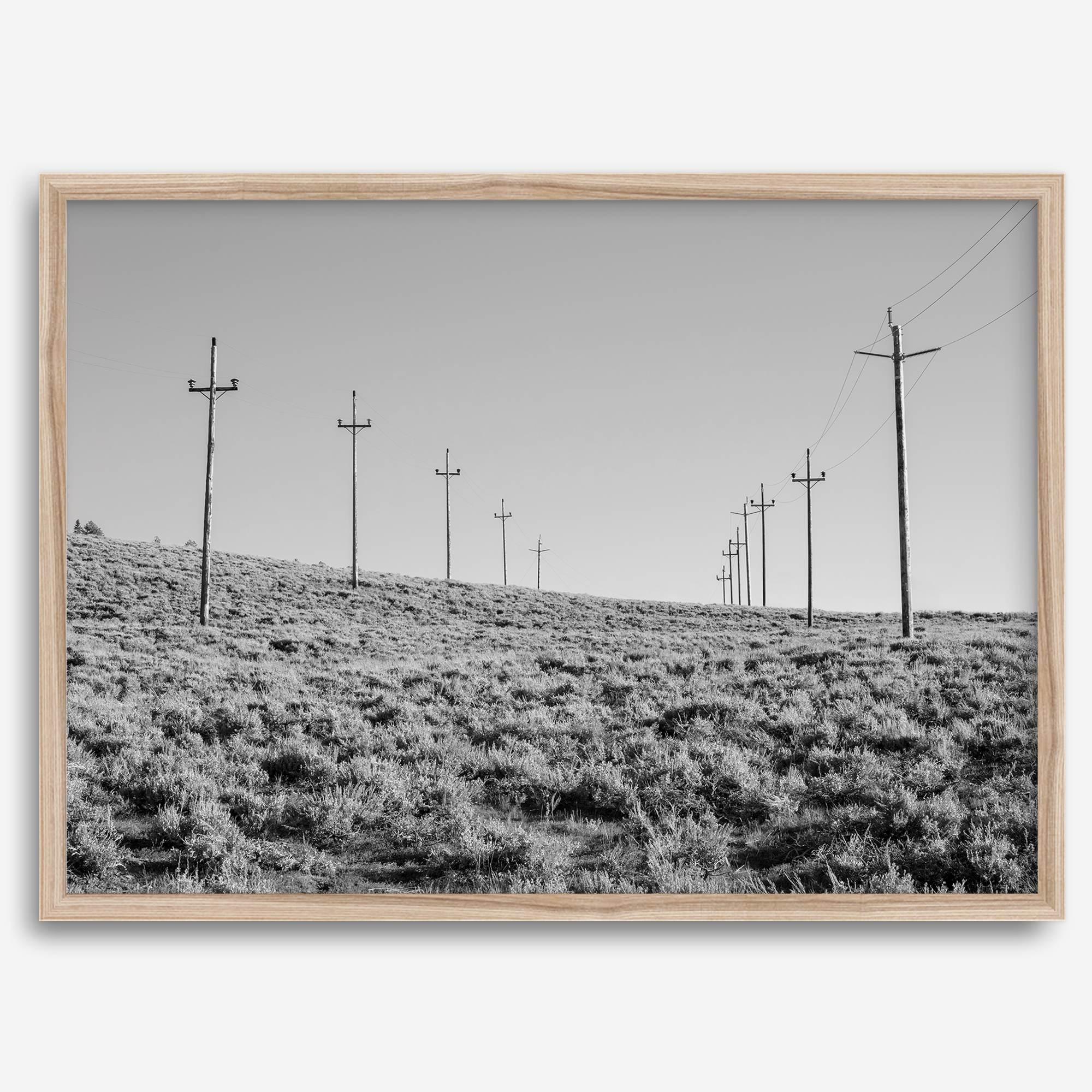 A black and white fine art photography print showcasing desert power lines in the Eastern Sierras in Americana decor style.
