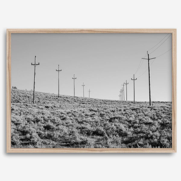 A black and white fine art photography print showcasing desert power lines in the Eastern Sierras in Americana decor style.