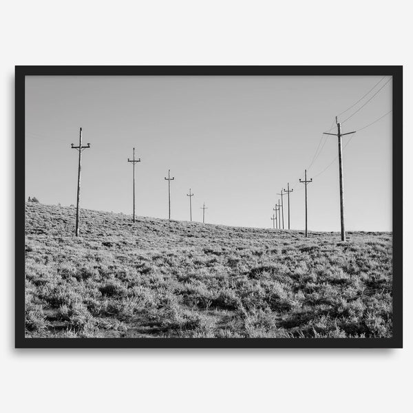 A black and white fine art photography print showcasing desert power lines in the Eastern Sierras in Americana decor style.