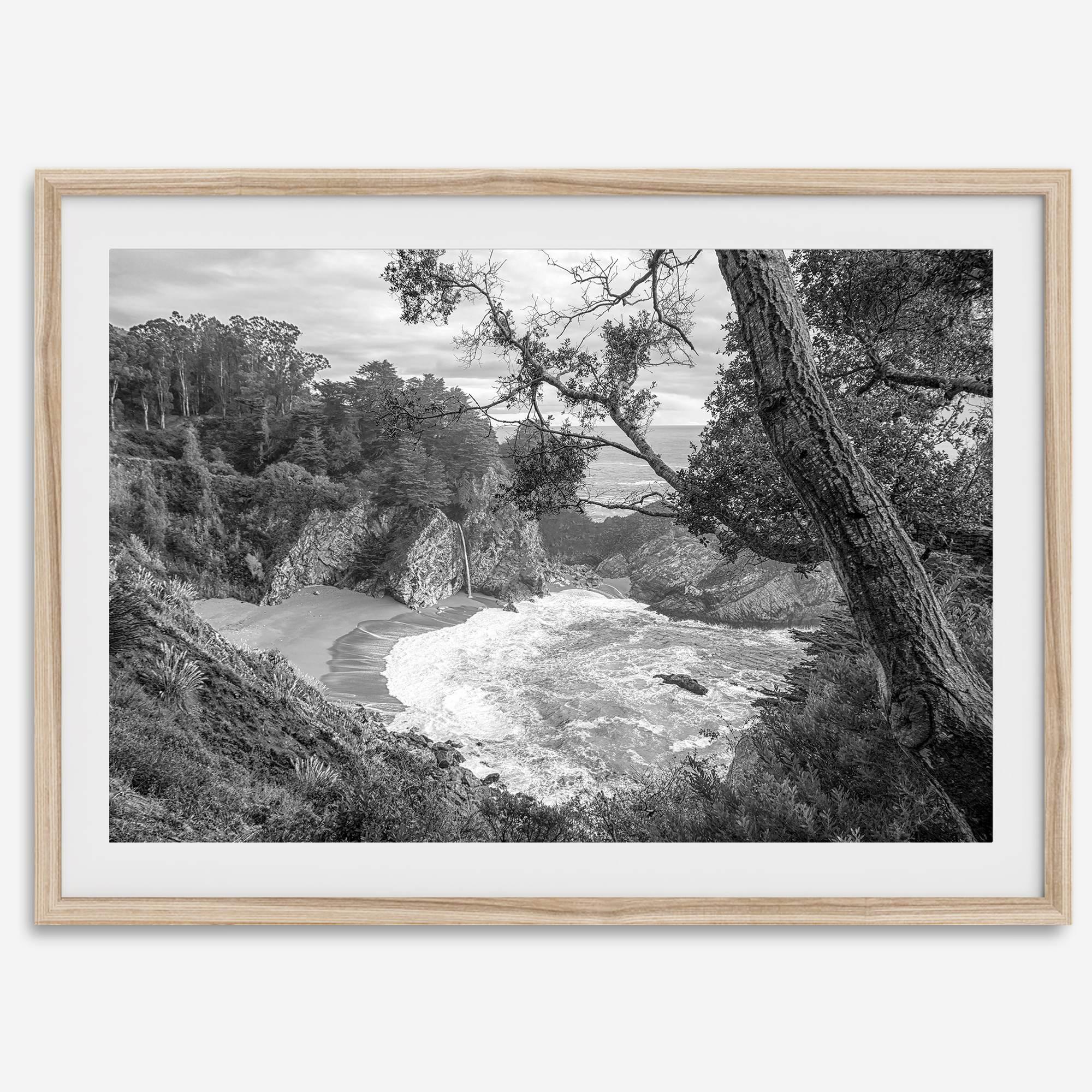 Black and white photo of McWay Falls flowing into the Pacific Ocean at Big Sur, California – fine art coastal print