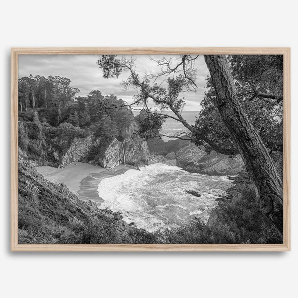 Black and white photo of McWay Falls flowing into the Pacific Ocean at Big Sur, California – fine art coastal print