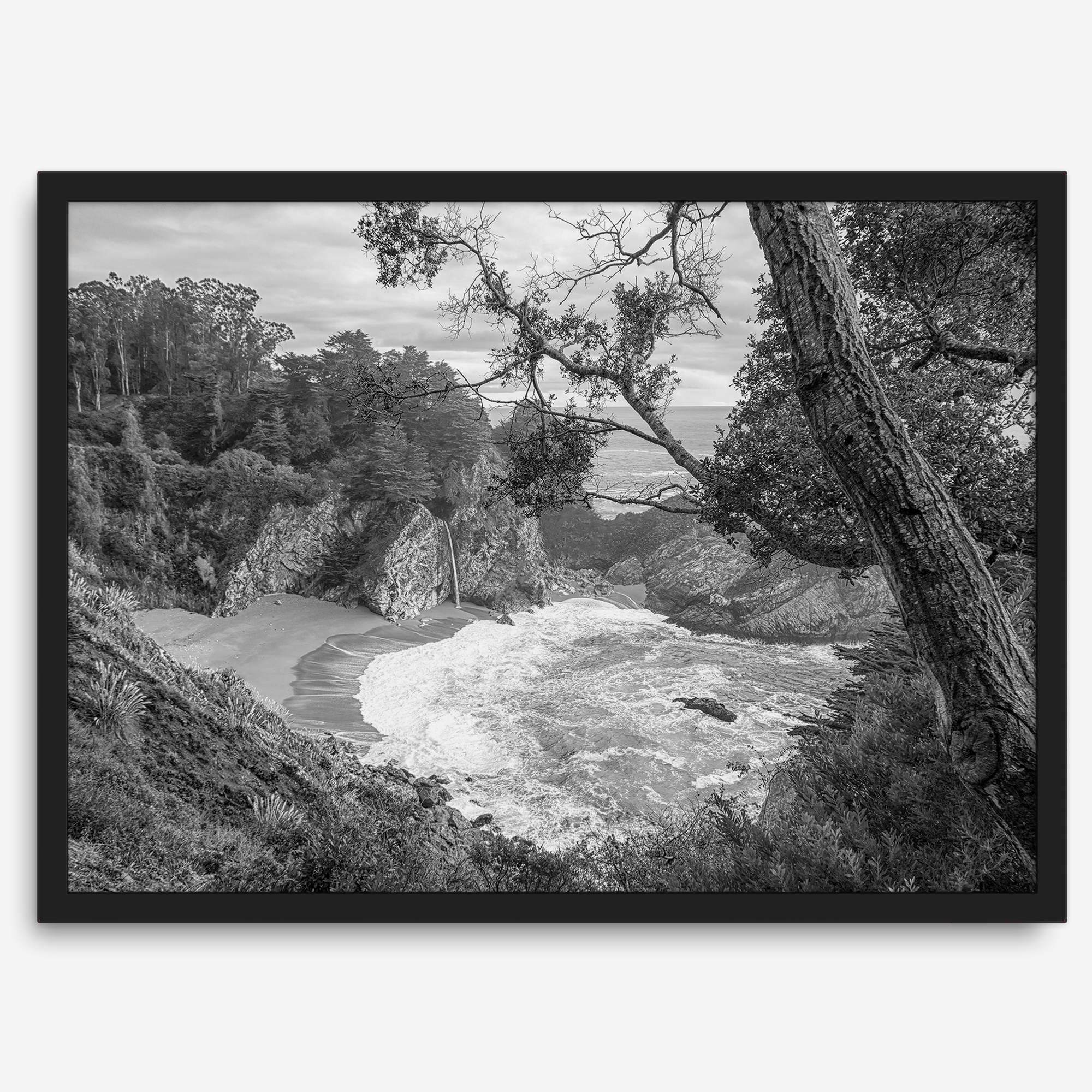 Black and white photo of McWay Falls flowing into the Pacific Ocean at Big Sur, California – fine art coastal print
