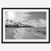 Black and white tropical wall art featuring a serene sunrise on a beach in Kauai, Hawaii with palm trees