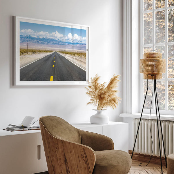 This stunning piece of desert wall art will take your breath away. This beautifully framed picture of a Death Valley National Park road leading towards the snow-covered mountains at the end of the desert will impress when hung on your walls.