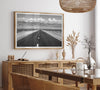 This stunning piece of black and white desert wall art will take your breath away. A beautifully framed picture of a Death Valley National Park road leading towards the snow-covered mountains at the end of the desert.