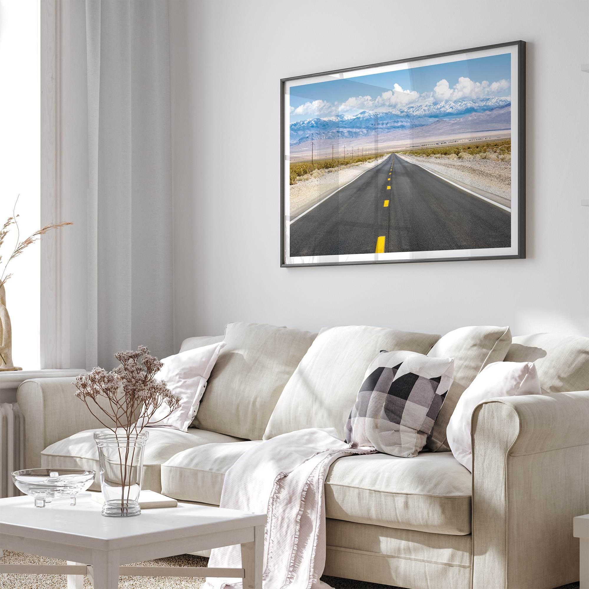 This stunning piece of desert wall art will take your breath away. This beautifully framed picture of a Death Valley National Park road leading towards the snow-covered mountains at the end of the desert will impress when hung on your walls.