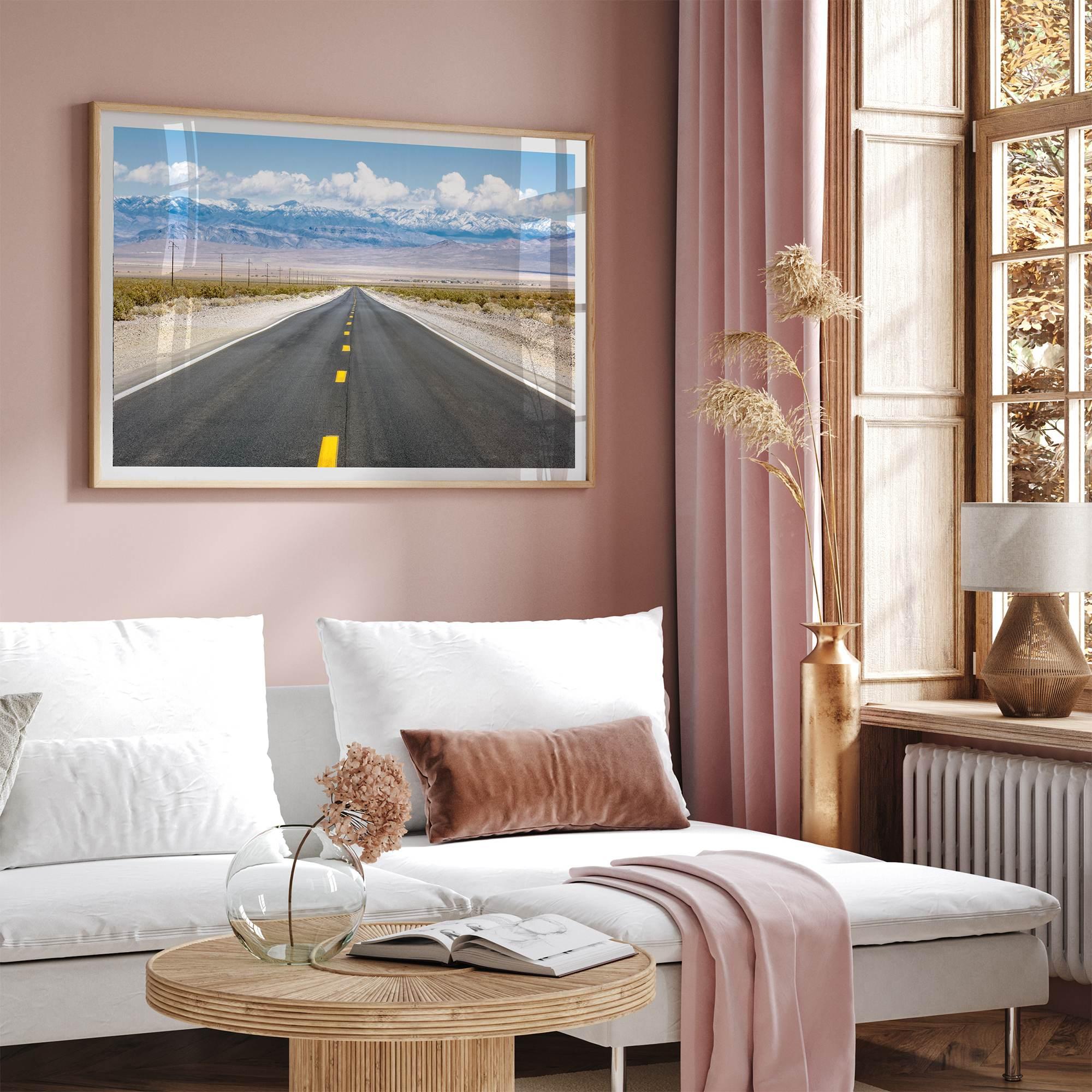 This stunning piece of desert wall art will take your breath away. This beautifully framed picture of a Death Valley National Park road leading towards the snow-covered mountains at the end of the desert will impress when hung on your walls.