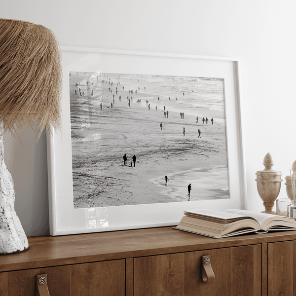 Black and white photo of people walking on Baker Beach in San Francisco – fine art coastal photography print.