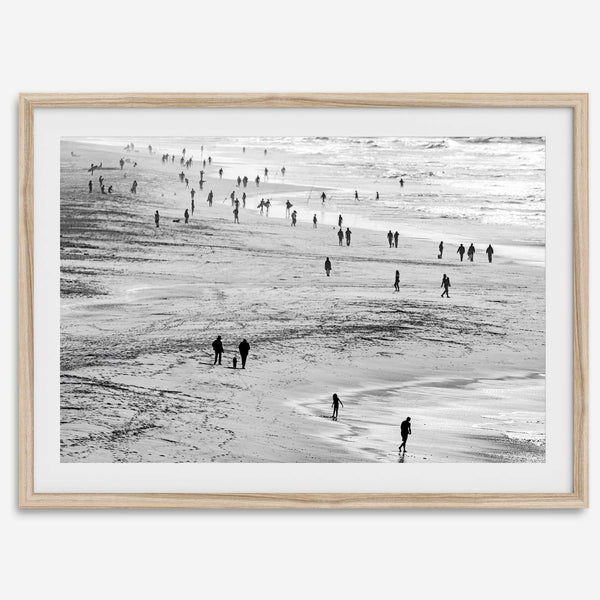 Black and white photo of people walking on Baker Beach in San Francisco – fine art coastal photography print.