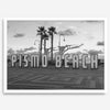 Black and white photo of the Pismo Beach street sign with palm trees and boardwalk – fine art coastal print