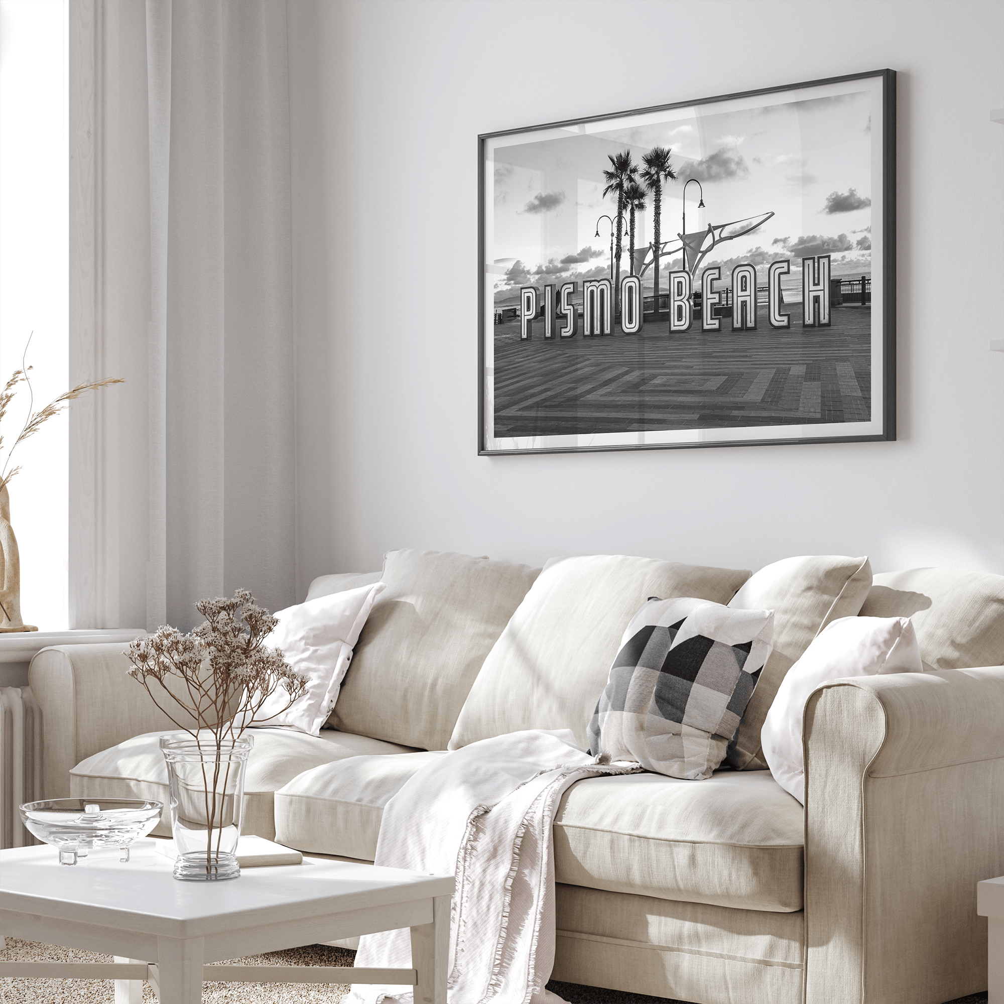 Black and white photo of the Pismo Beach street sign with palm trees and boardwalk – fine art coastal print