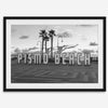 Black and white photo of the Pismo Beach street sign with palm trees and boardwalk – fine art coastal print