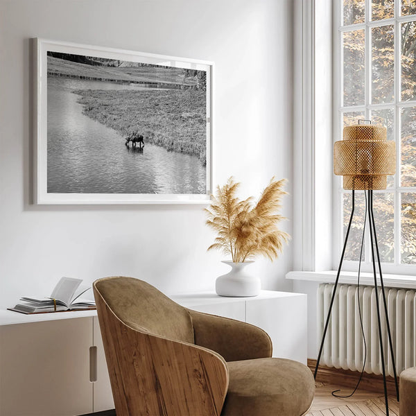 Capture the spirit of Rocky Mountain National Park with this black and white fine art Moose photo print. A majestic Moose stands drinking from the valley river. A timeless nature wall art that transports you to the calming beauty of Colorado.