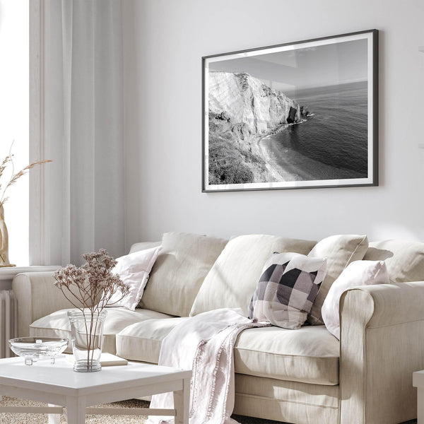 A black and white fine art ocean wall art print of a coastal cliff and beautiful beach in Chimney Rock trail, Point Reyes, California.