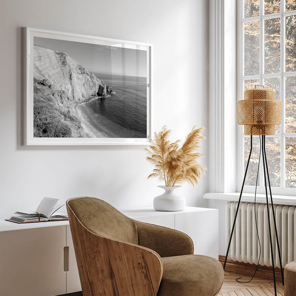A black and white fine art ocean wall art print of a coastal cliff and beautiful beach in Chimney Rock trail, Point Reyes, California.