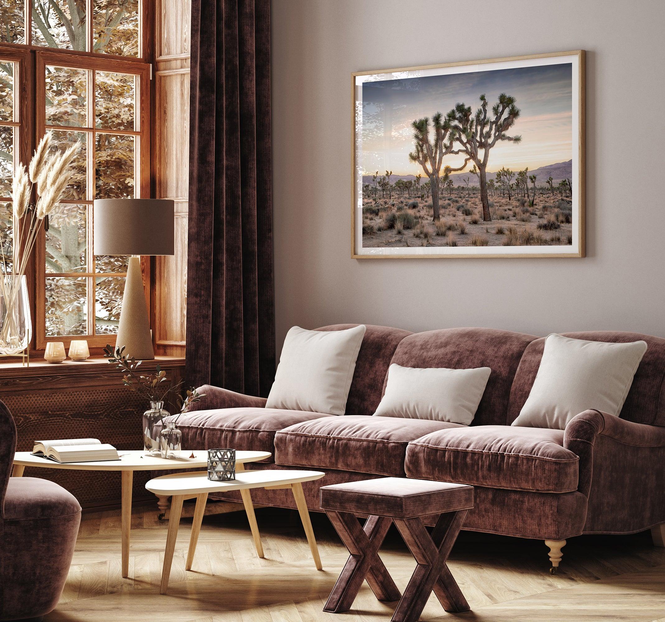 A framed fine art photography print from Joshua Tree National Park of two Joshua Trees in the Sunset. The trees appear to be holding hands. This California desert landscape wall art shows the famous Joshua Trees and desert plants in the Sunset.