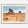 A framed or unframed fine art photography desert print of a horse in Monument Valley, Utah. This wall art features unique rock formations native to the Monument Valley area. This horse wall art comes in different sizes, including extra large.