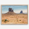 A framed or unframed fine art photography desert print of a horse in Monument Valley, Utah. This wall art features unique rock formations native to the Monument Valley area. This horse wall art comes in different sizes, including extra large.
