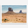 A framed or unframed fine art photography desert print of a horse in Monument Valley, Utah. This wall art features unique rock formations native to the Monument Valley area. This horse wall art comes in different sizes, including extra large.