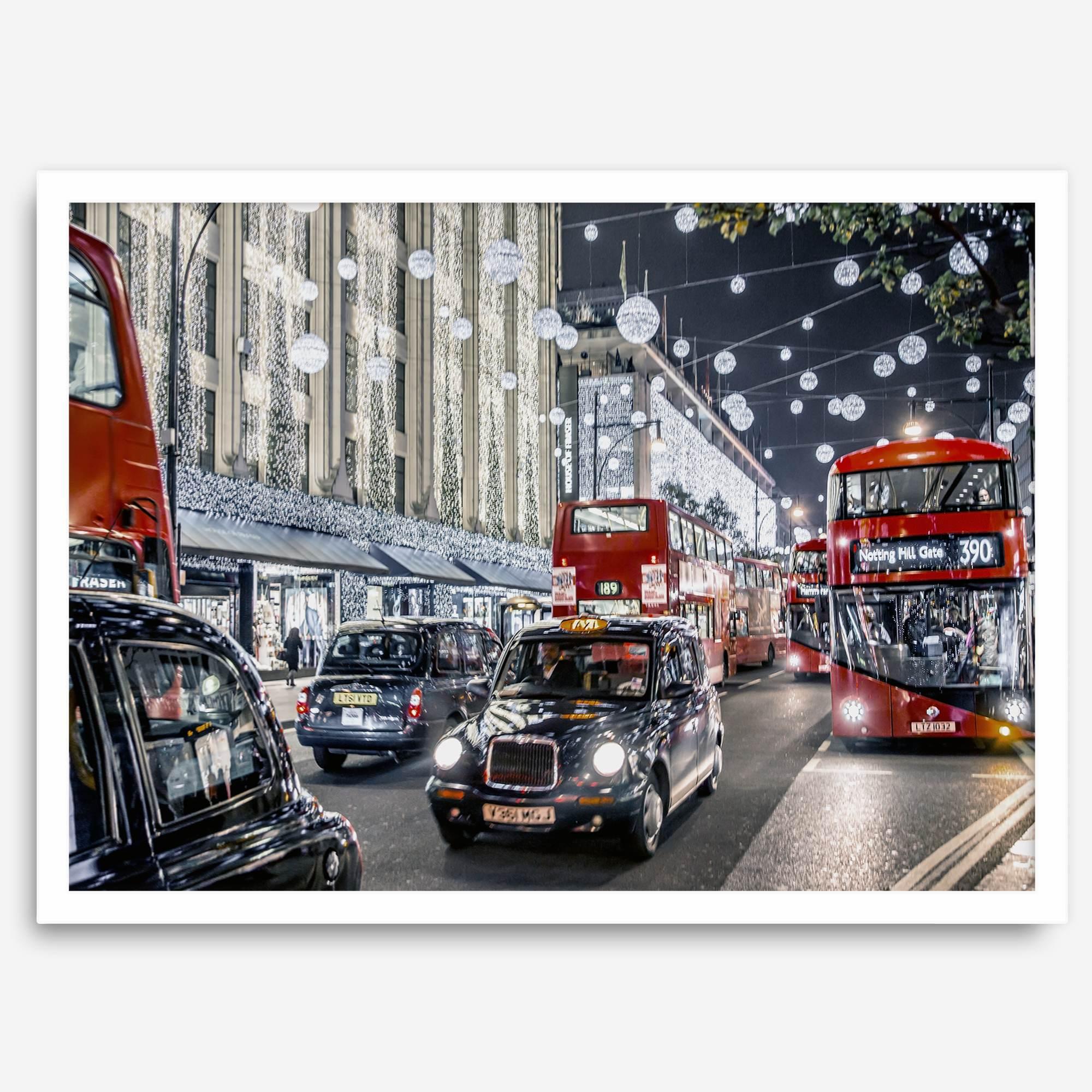 Fine art photography print of a bustling London street during Christmas, featuring double-decker buses, black taxis, and festive holiday lights.