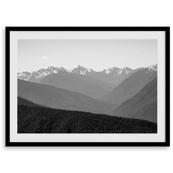 Black and white mountain photography wall art showcasing multiple layers of snowy mountain ranges.