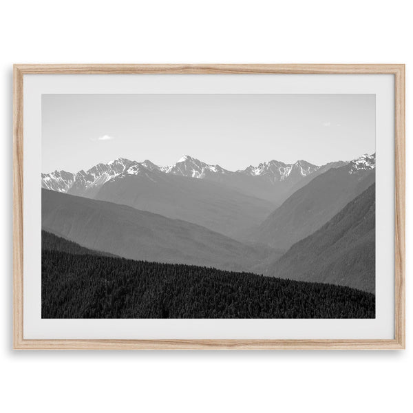 Black and white mountain photography wall art showcasing multiple layers of snowy mountain ranges.