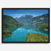 A fine art poster print of Diablo Lake in North Cascades National Park showcasing the deep blue water and the reflection of the surrounding mountains.