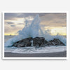A dramatic fine art beach print showing a huge ocean wave crashing on a beautiful beach in California during sunset