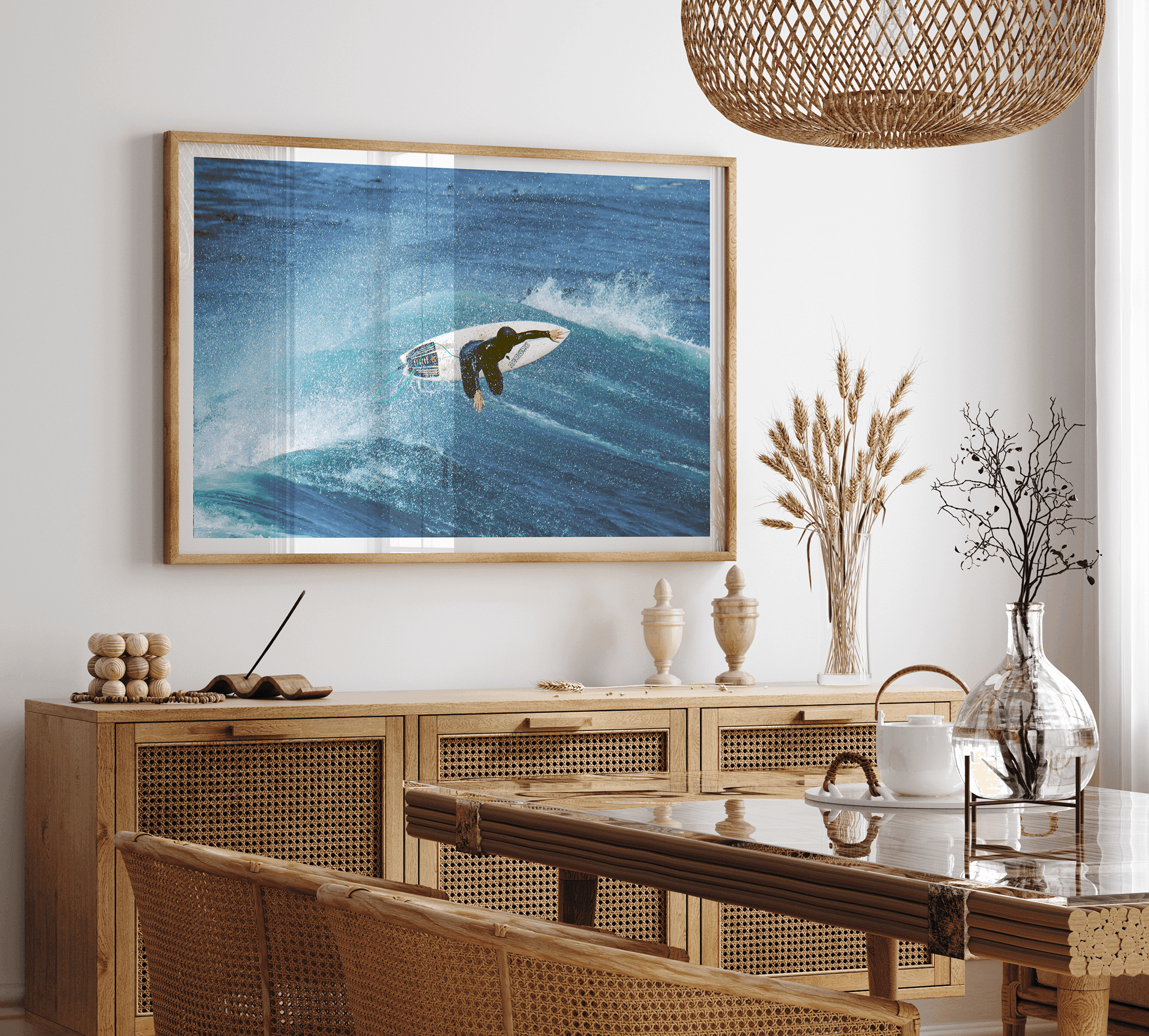 Surfer flying above a turquoise wave in Santa Cruz captured in vibrant ocean photography.