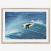 Surfer flying above a turquoise wave in Santa Cruz captured in vibrant ocean photography.