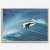 Surfer flying above a turquoise wave in Santa Cruz captured in vibrant ocean photography.