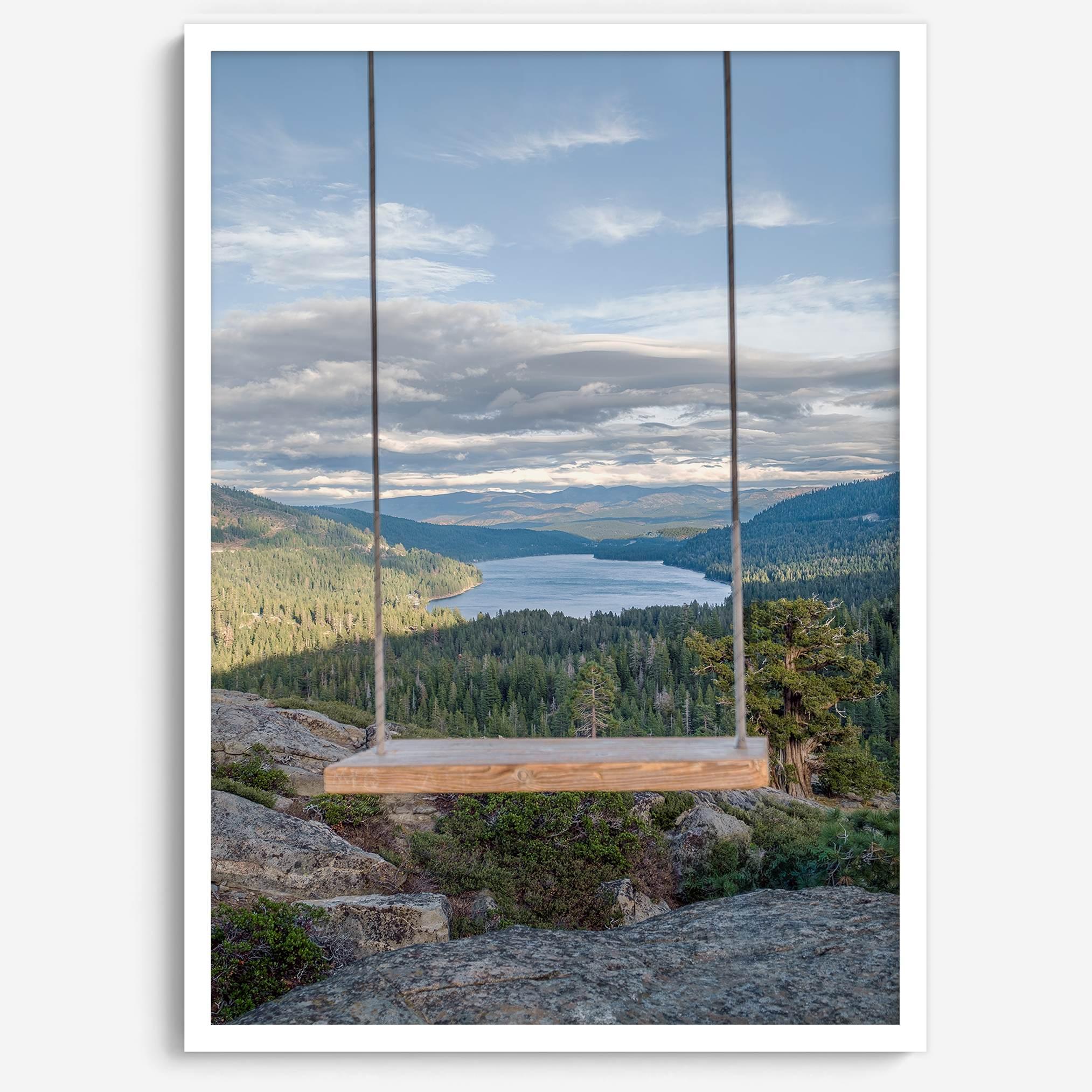 A fine art-inspiring photo print showcasing a swing on a tree with the backdrop of Donner Lake and the Pacific Northwest mountains.