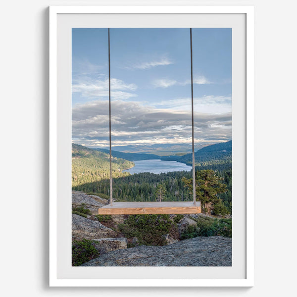 A fine art-inspiring photo print showcasing a swing on a tree with the backdrop of Donner Lake and the Pacific Northwest mountains.