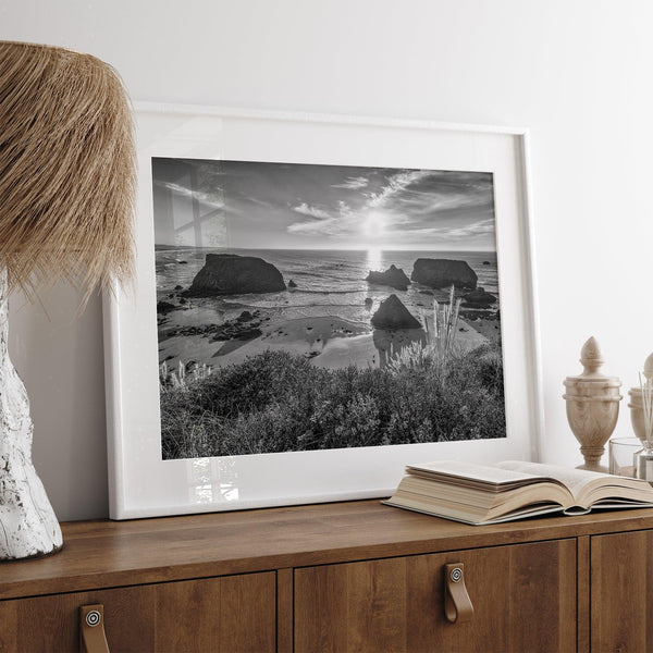 Black and white beach sunset photography wall art from Fort Bragg, California, featuring a dramatic Pacific Northwest coastline seascape.