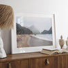 Framed Pfeiffer Beach wall art with foggy Big Sur cliffs and coastal shoreline
