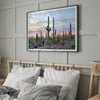 Cactus art print of saguaro cacti at sunset with pastel sky over desert landscape.
