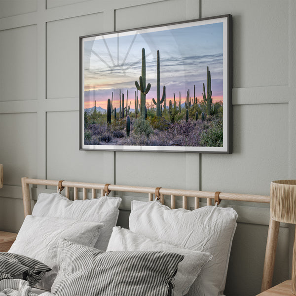 Cactus art print of saguaro cacti at sunset with pastel sky over desert landscape.
