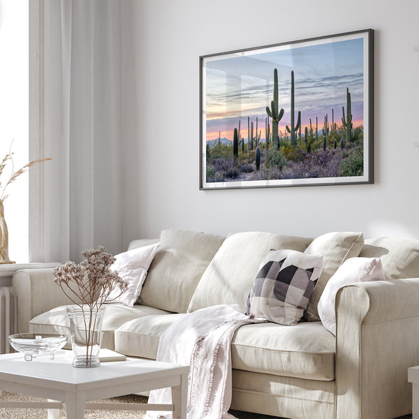 Cactus art print of saguaro cacti at sunset with pastel sky over desert landscape.