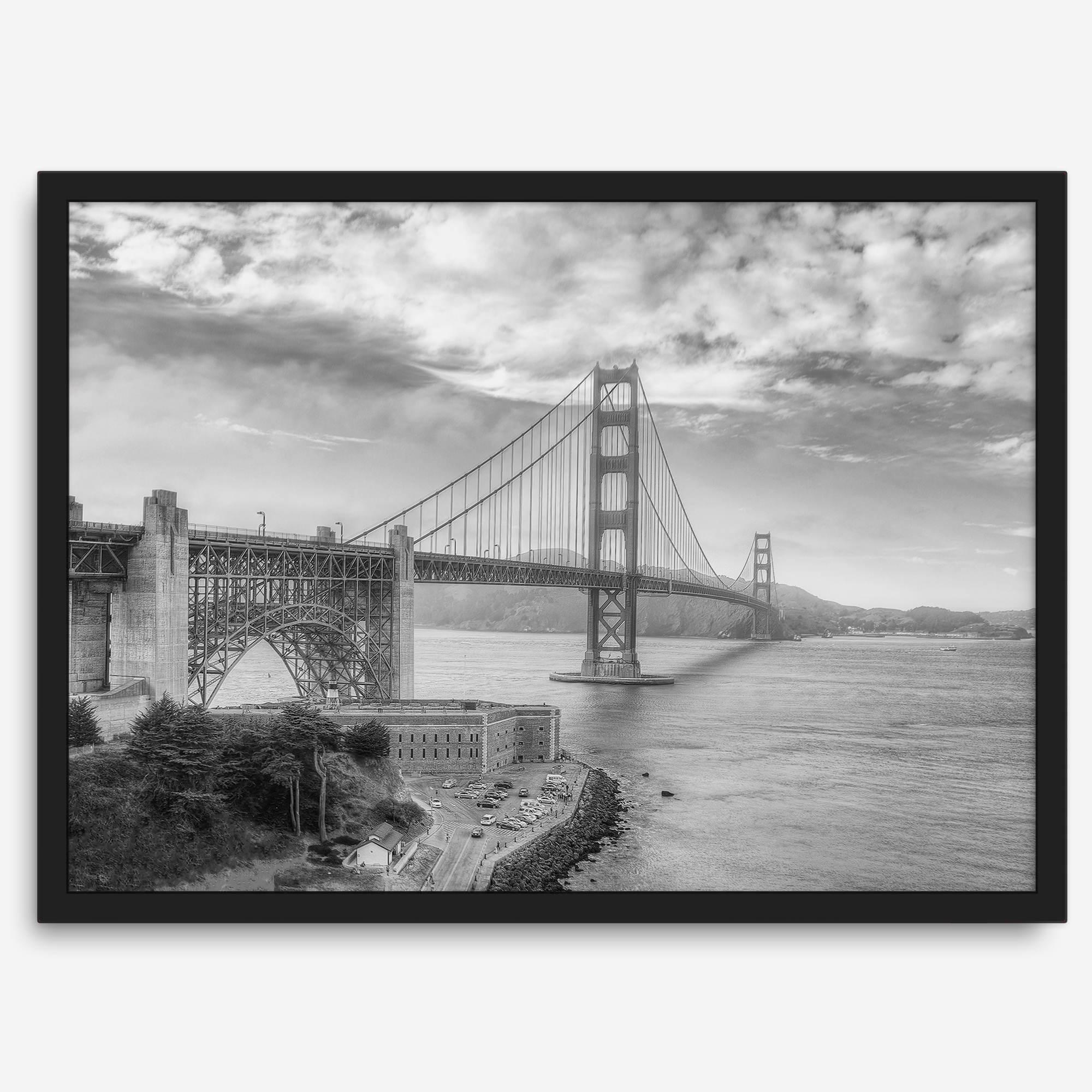 Golden Gate Bridge Wall Art in black-and-white HDR photography with dramatic clouds and water reflections.