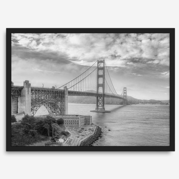 Golden Gate Bridge Wall Art in black-and-white HDR photography with dramatic clouds and water reflections.